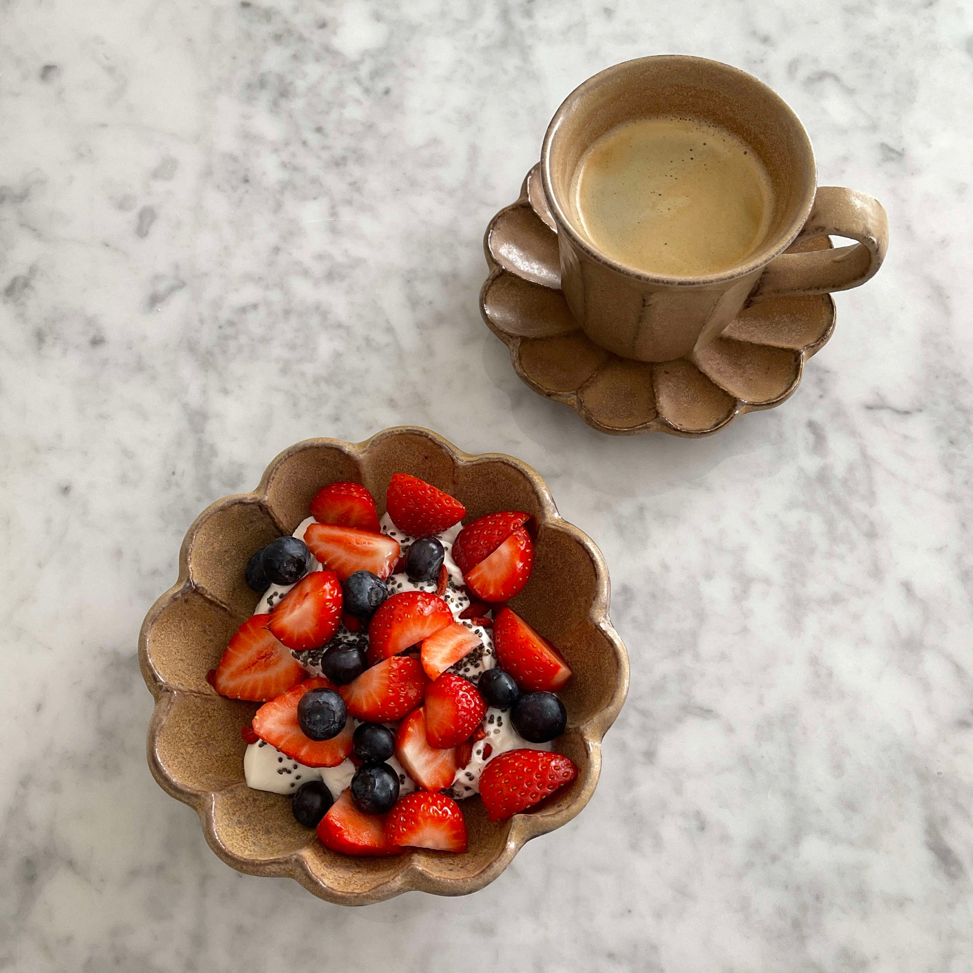 Flower-shaped Rinka Bowl 16cm with fresh fruit and matching mug, handcrafted porcelain from Kaneko Kohyo, Japan.