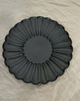 Elegant Rinka Plate by Yoshida Pottery with nature-inspired scalloped design, adding sophistication to any table setting.
