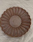 Elegant Rinka Plate by Yoshida Pottery with nature-inspired patterns, designed by ceramist Masakazu Yoshida.
