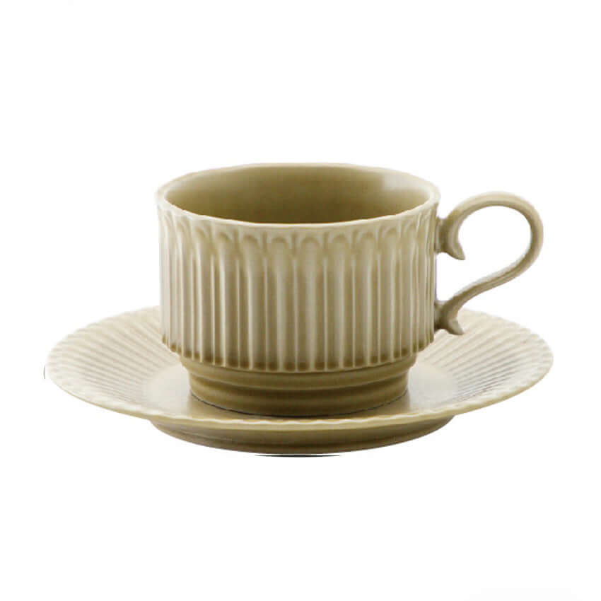 Elegant Storia porcelain coffee cup and saucer with antique European-inspired design from Koyo's Gifu Prefecture.