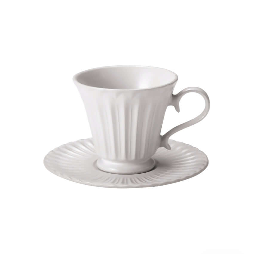 Storia Tall Coffee Cup & Saucer with elegant porcelain texture, 235cc, white finish, evoking nostalgia and sophistication.