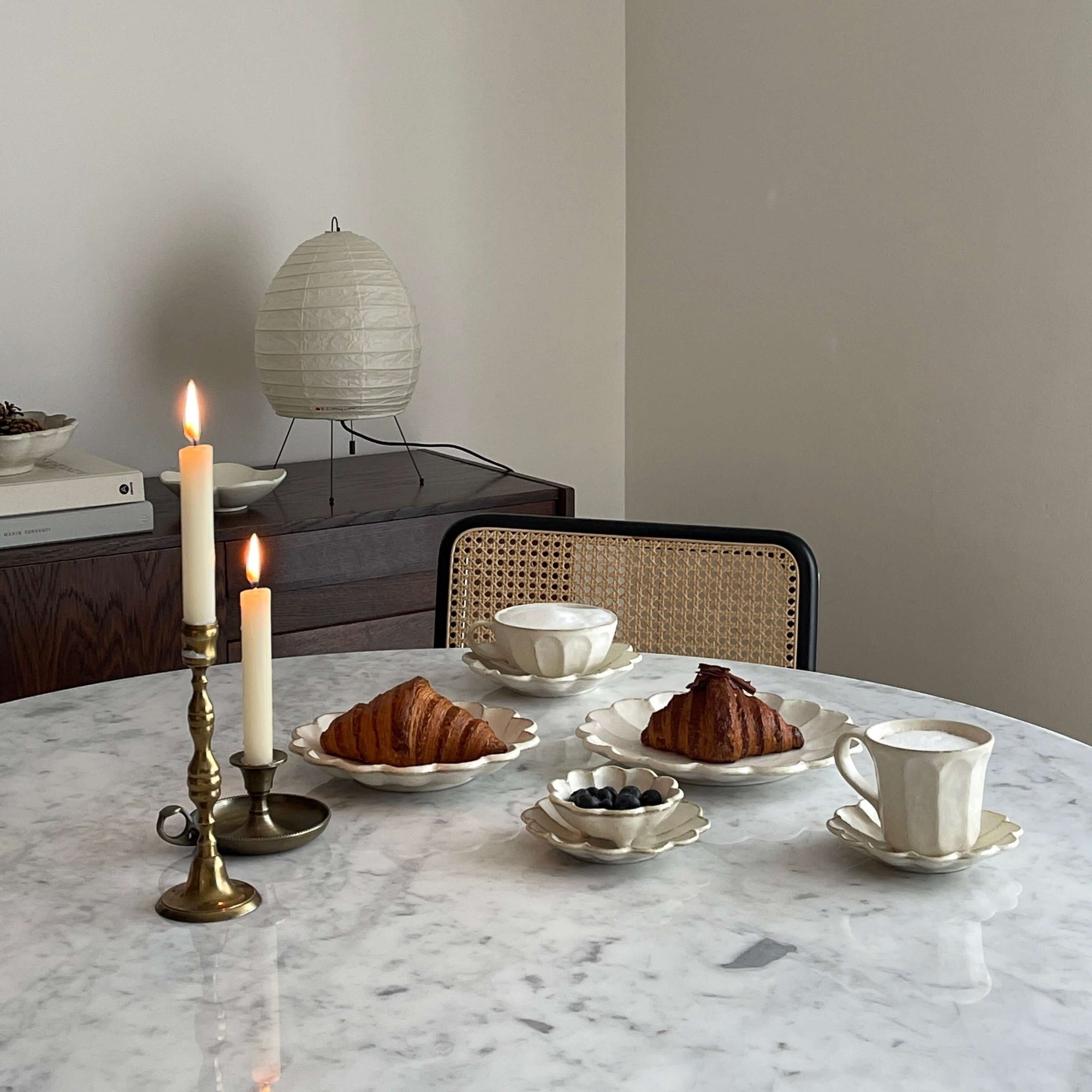 Elegant Rinka Bundle 2 table setting with handcrafted plates and cups, showcasing round edges and artistic Japanese design.