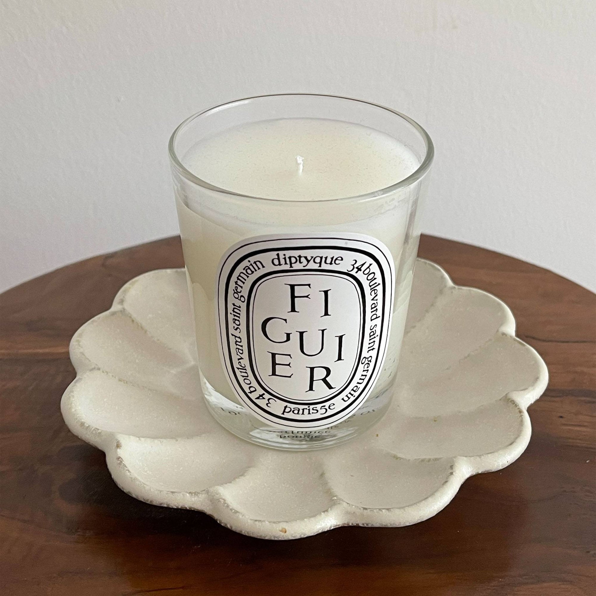Diptyque Figuier candle on Rinka Plate 15cm by Kaneko Kohyo, showcasing elegant Japanese porcelain craftsmanship.