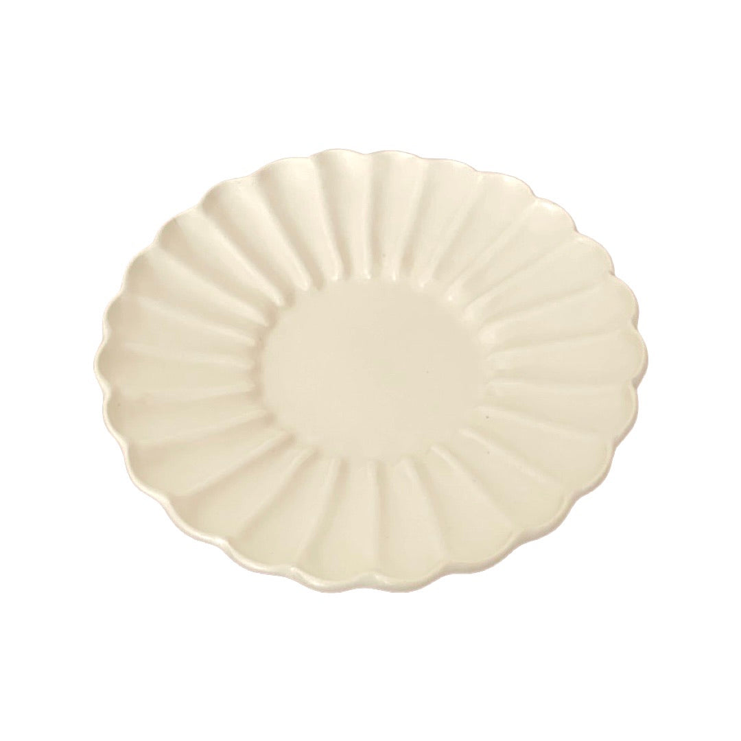 Elegant Rinka Plate by Yoshida Pottery with nature-inspired patterns, crafted by ceramist Masakazu Yoshida, adding style to table settings.
