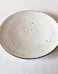 Rila Ivory porcelain plate by Kaneko Kohyo, featuring a textured, warm finish, 11.5cm diameter, made in Japan, microwave safe.