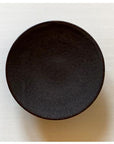 Rila Black porcelain plate by Kaneko Kohyo, 11.5cm diameter, matte finish, textured surface, Japanese craftsmanship.