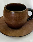 Rila Brown Mug by Kaneko Kohyo, textured porcelain with matte finish, on matching saucer, perfect hand-fit, 340ml capacity.