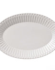 Storia Oval Plate 32cm with textured porcelain and flecked lacquer finish, evokes nostalgia and elegance, made in Japan