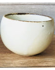 Elegant Rila Tea Cup with warm matte finish, crafted by Kaneko Kohyo for versatile use. Compact, stackable, 6.5cm diameter.