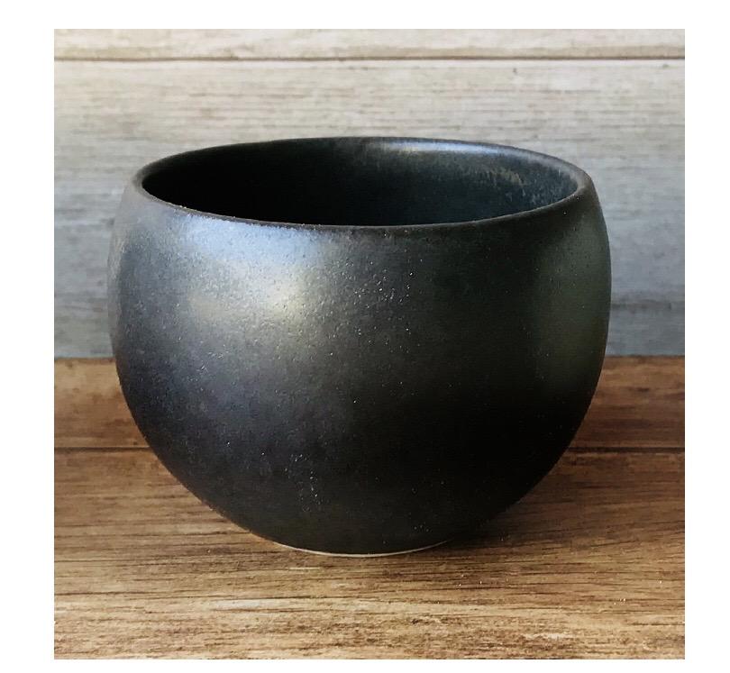 Matte black Rila Tea Cup by Kaneko Kohyo, perfect for tea, desserts, or single-serve dishes, with a compact, stackable design.