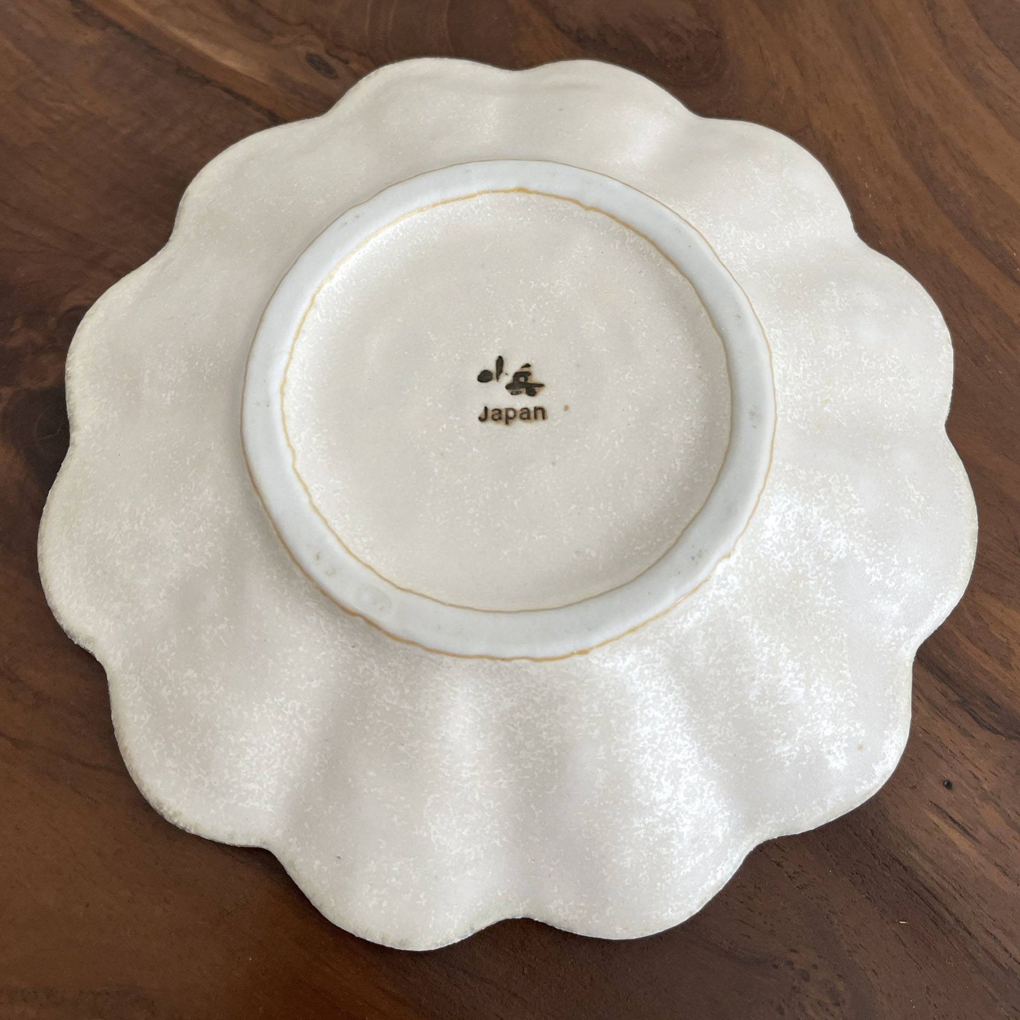 Bottom view of Rinka Plate 15cm, handcrafted porcelain by Kaneko Kohyo, showcasing unique design, made in Japan.