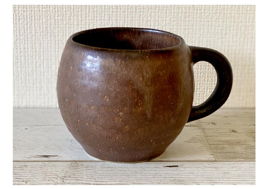 Rila Brown Mug with textured porcelain finish, warm matte color, microwave-safe, crafted by Kaneko Kohyo, perfect palm size.