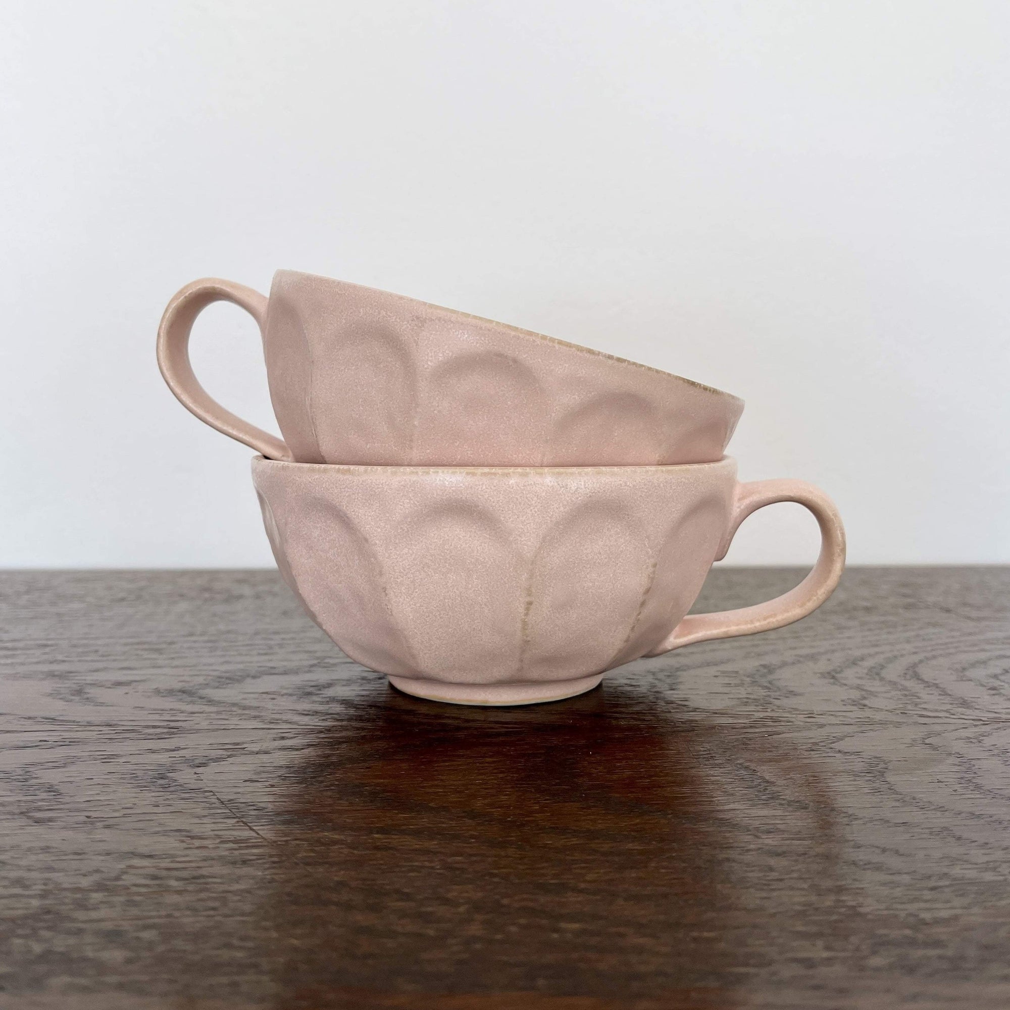 Elegant Rinka Soup Cups by Kaneko Kohyo in a subtle floral design, made from delicate porcelain, perfect for enhancing your table setting.