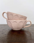 Elegant Rinka Soup Cups by Kaneko Kohyo in a subtle floral design, made from delicate porcelain, perfect for enhancing your table setting.