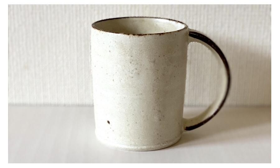 Rila Ivory Straight Mug, tastefully textured porcelain, microwave-safe, stackable, compact size, perfect for everyday use.