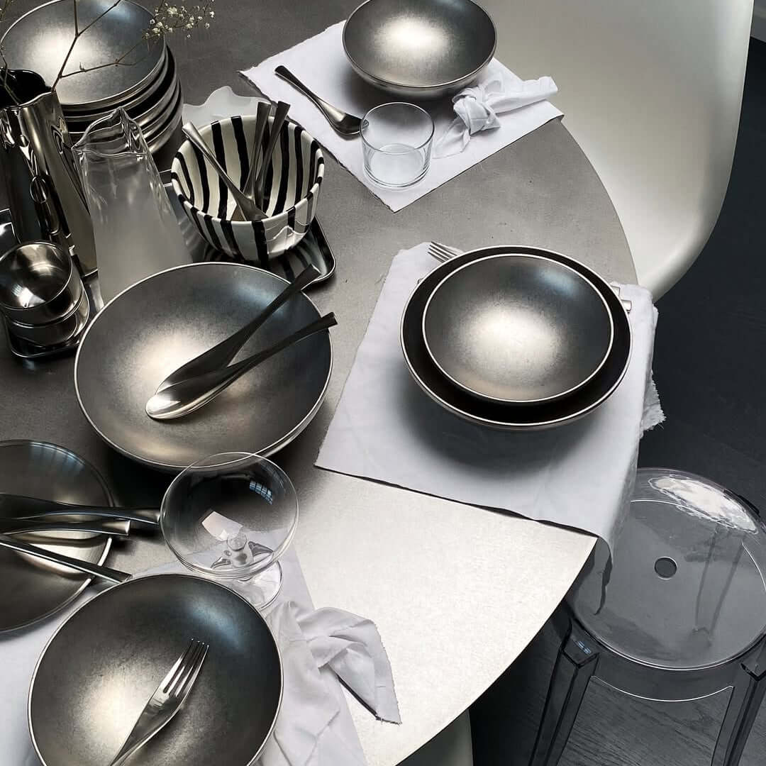 Host's Choice bundle with Kyoto steel bowls, cutlery and cups on a table