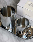Elegant Milano Duo Set with double-walled stainless steel cups and tray on marble surface, perfect for modern coffee enjoyment.