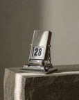Perpetual rotating desk calendar detail, minimalist battery-free design by LoveÉcru