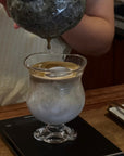 Pouring coffee into the Lune Sculptural Goblet