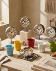 Trio Gift Sets in several mug colours arranged on a table