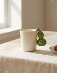 Fruit Handle Ceramic Mug styled on a table