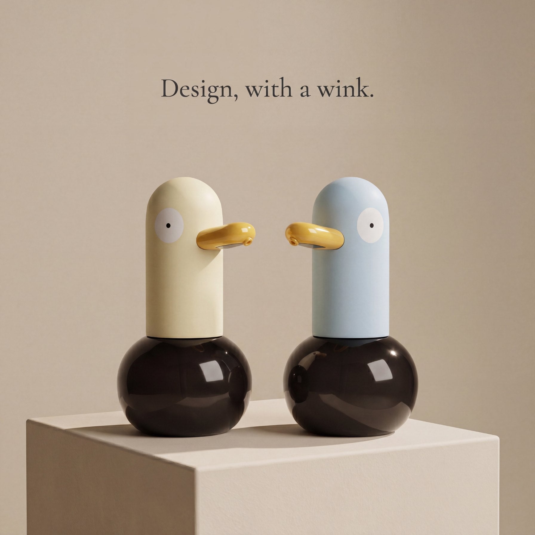 Butter cream duck-shaped automatic foam soap dispenser on a marble bathroom vanity — LoveÉcru" (vary per image: side profile, both colours, foam close-up, refill, in use).
