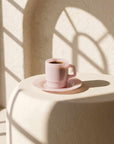 Blush Pink Pastel Muse Mug with espresso on a stone table
