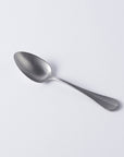 Vintage Inox Baguette Classic Series spoon with elegant design and smooth finish for versatile use in formal and casual settings.