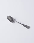 Vintage Inox Baguette Classic Series spoon with elegant handle and timeless design for versatile dining occasions.