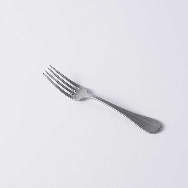 Vintage Inox Baguette Classic Series dinner fork with elegant handle design, perfect for casual or formal dining occasions.