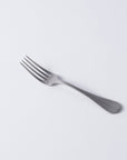 Vintage Inox Baguette Classic Series dinner fork with elegant handle design, perfect for casual or formal dining occasions.