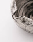 Close-up of the KAGE Artisan Matcha Bowl spout and brushed glaze