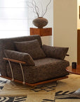 Stylish Nozomi Banca Sofa by LoveÉcru in modern living room setting with accent decor and natural lighting.