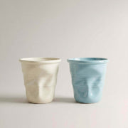 Beige and blue Crushed Ceramic Mugs side by side