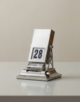 Rotating perpetual desk calendar in metal — battery-free date keeper by LoveÉcru