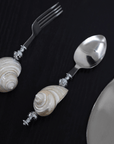 Shoreline fork and spoon with shell handles, close-up
