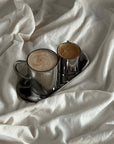 Milano Duo Set with cappuccino in the tall cup and espresso in the small cup on white linen