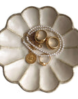 Porcelain Rinka Plate 14cm with jewelry, showcasing Japanese craftsmanship and elegant design.