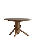 Wooden Clown Table with playful building block-inspired design, shown in natural finish with unique, angled leg structure.