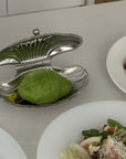 Vintage Shell-Shaped Silver Trinket Case used as a butter dish with avocado at the table