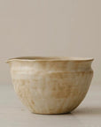Hand-glazed matcha pouring bowl in Warm Sand, side view
