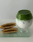 Lumi Stem Glass with an iced matcha latte beside dorayaki pancakes