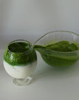 Lumi Stem Glass with matcha beside a glass matcha bowl