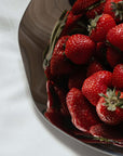 Close-up of strawberries in the Sculpted Stainless Steel Bowl