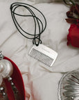 Ocean Bundle metal comb and shell trinket case with red flowers