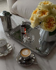 Signature Serving Tray with yellow roses, a French press and a cappuccino