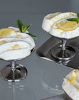 Two Elegant Dessert Cups filled with lemon meringue dessert