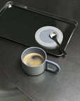 Minimalism Stainless Steel Serving Tray with an espresso cup and saucer