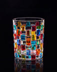 Tessera Hand-Painted Mosaic Glass, tall, on a black background