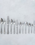 Vintage Inox Baguette Classic Series cutlery set displayed on a light surface, showcasing elegant and timeless design.